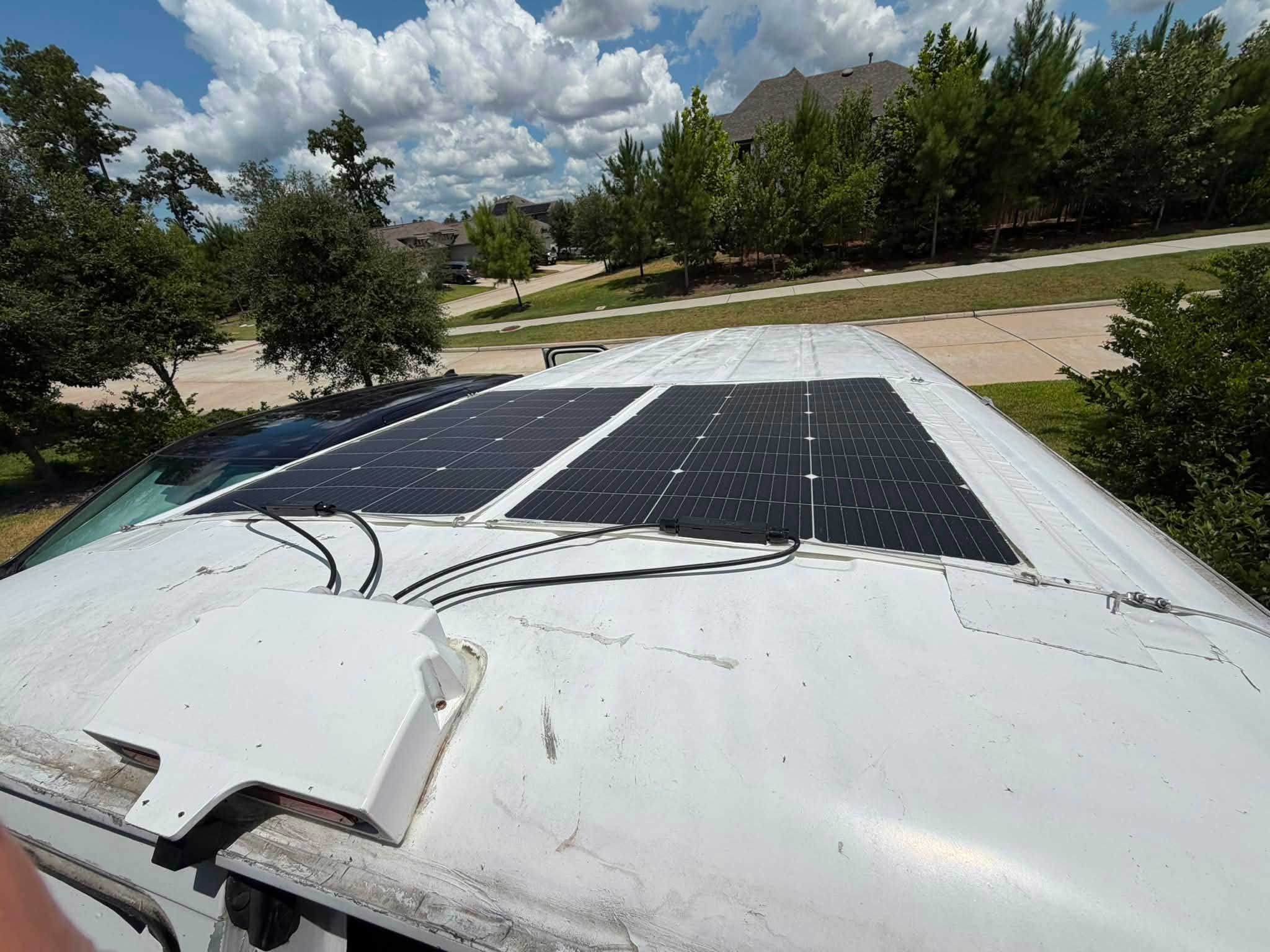 Bright Solar L Series 100W Flexible Solar Panel: Product Overview 4 Flexible solar panel installed on the roof of a camper van for mobile solar power.